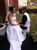 Ashley and Patrick on the steps of TheOlde North Chapel wedding ceremony venue, Richmond, Indiana.  