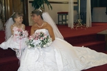 Bride and child on the alter of historic Indiana wedding chapel, Richmond, Indiana