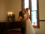 Couple had a vintage wedding ceremony, complete with traditional brass candelabras and roses at the historic Olde North Wedding Chapel, Richmond Indiana wedding ceremony site